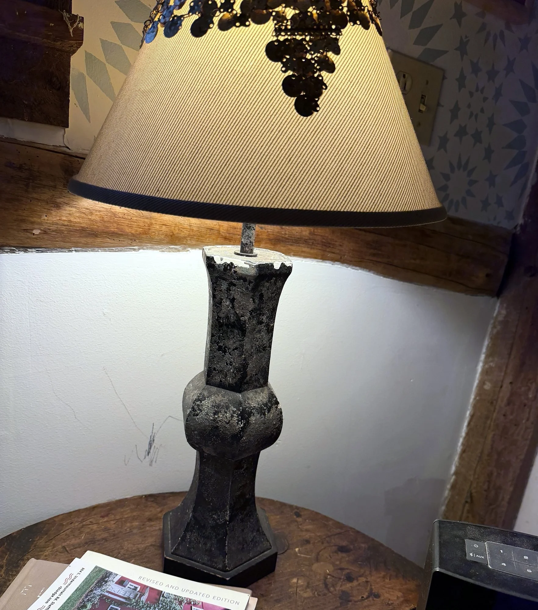115 Faux-stone vase table lamp with coin-fringe shade.jpg