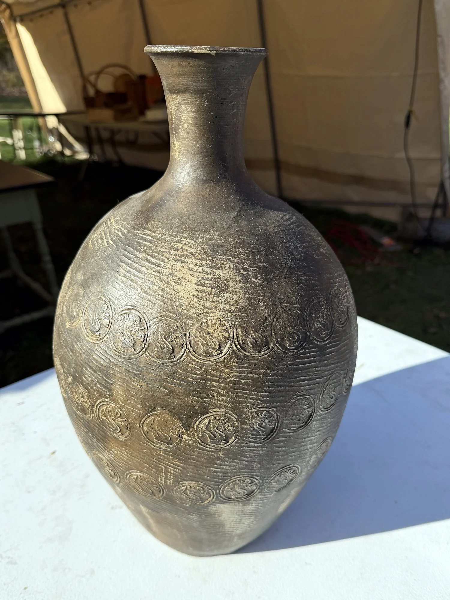 201 Black clay bottle vase with stamped roundels.jpg