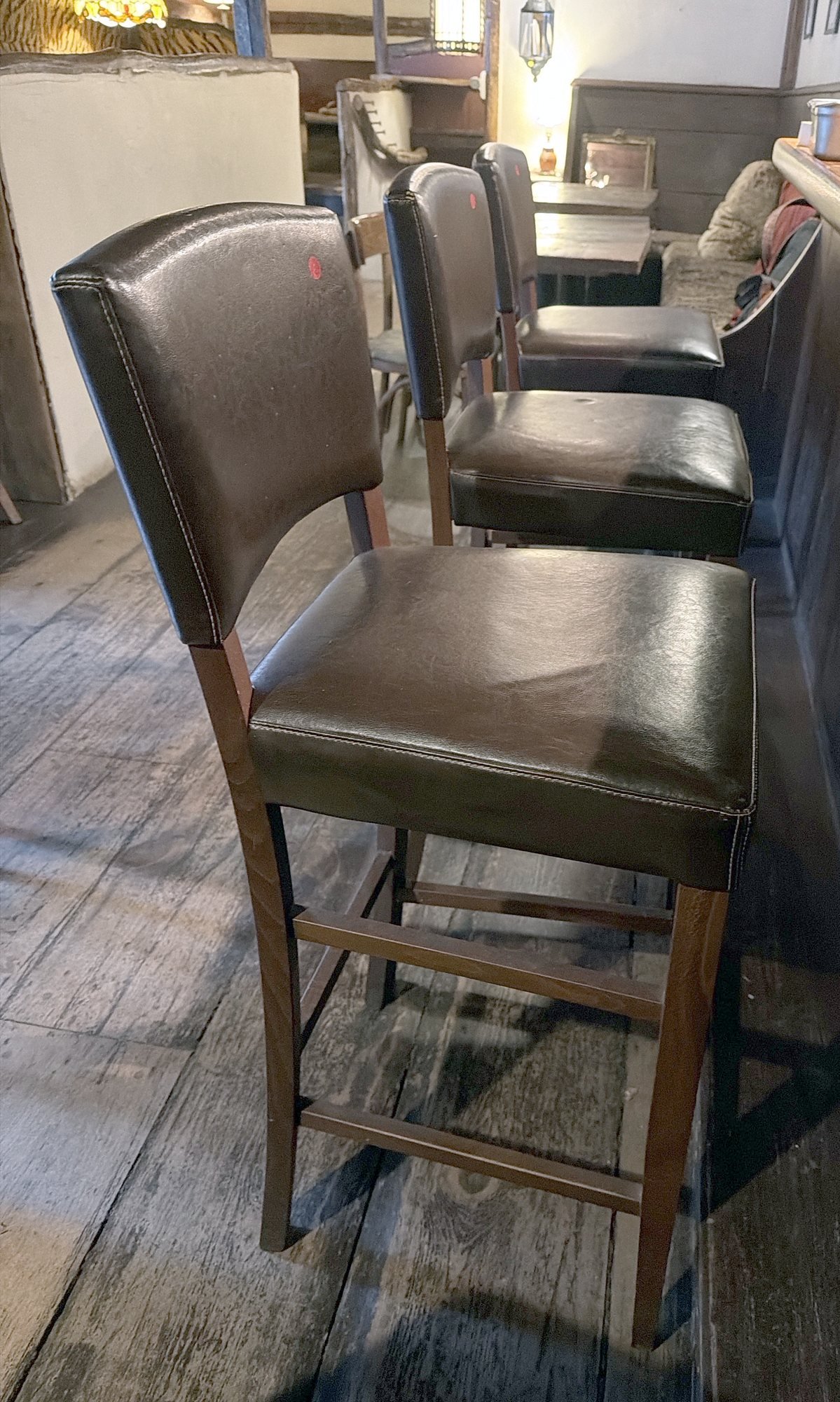 249 Brown faux-leather bar stools.jpg