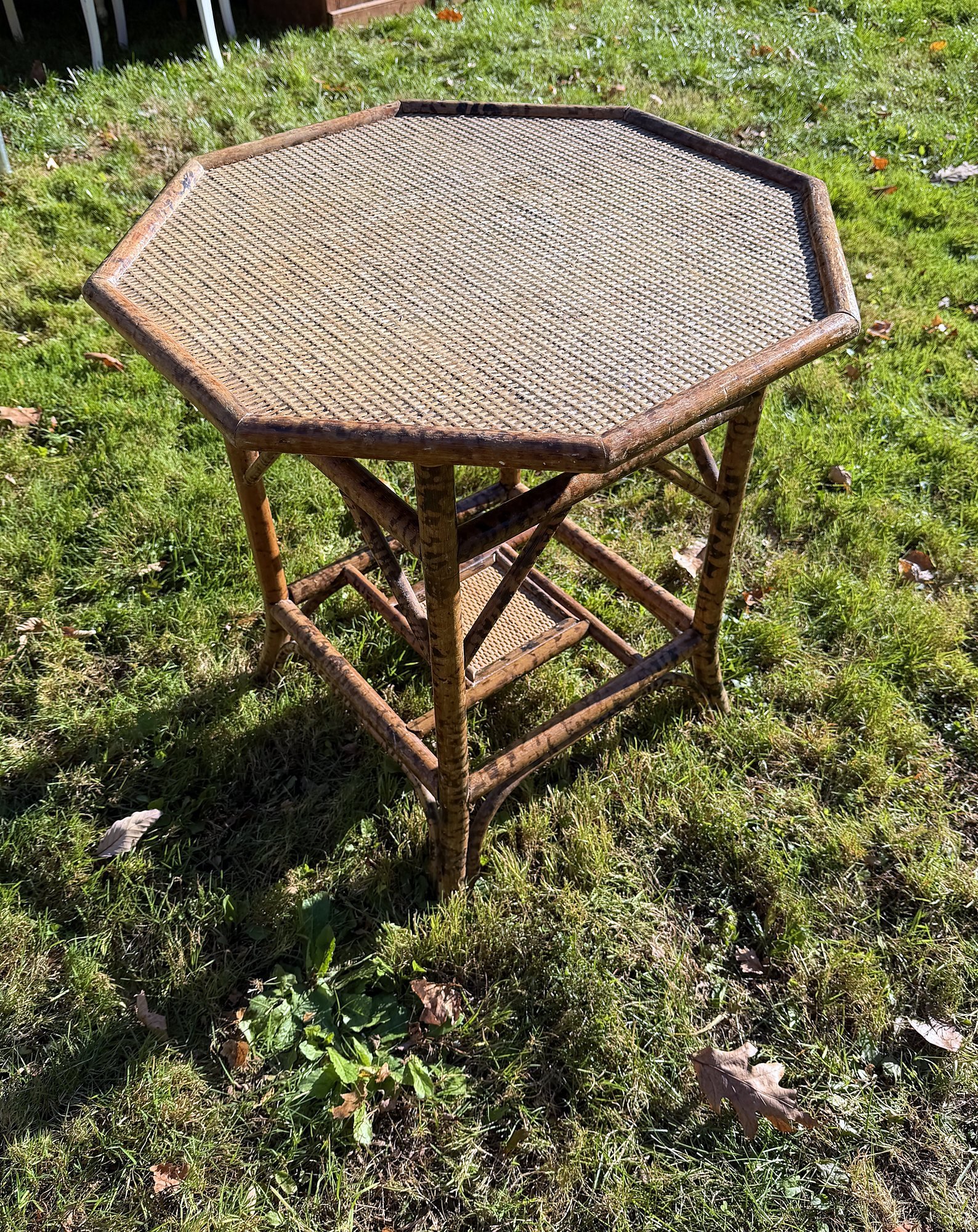 Octagonal rattan side table.jpg