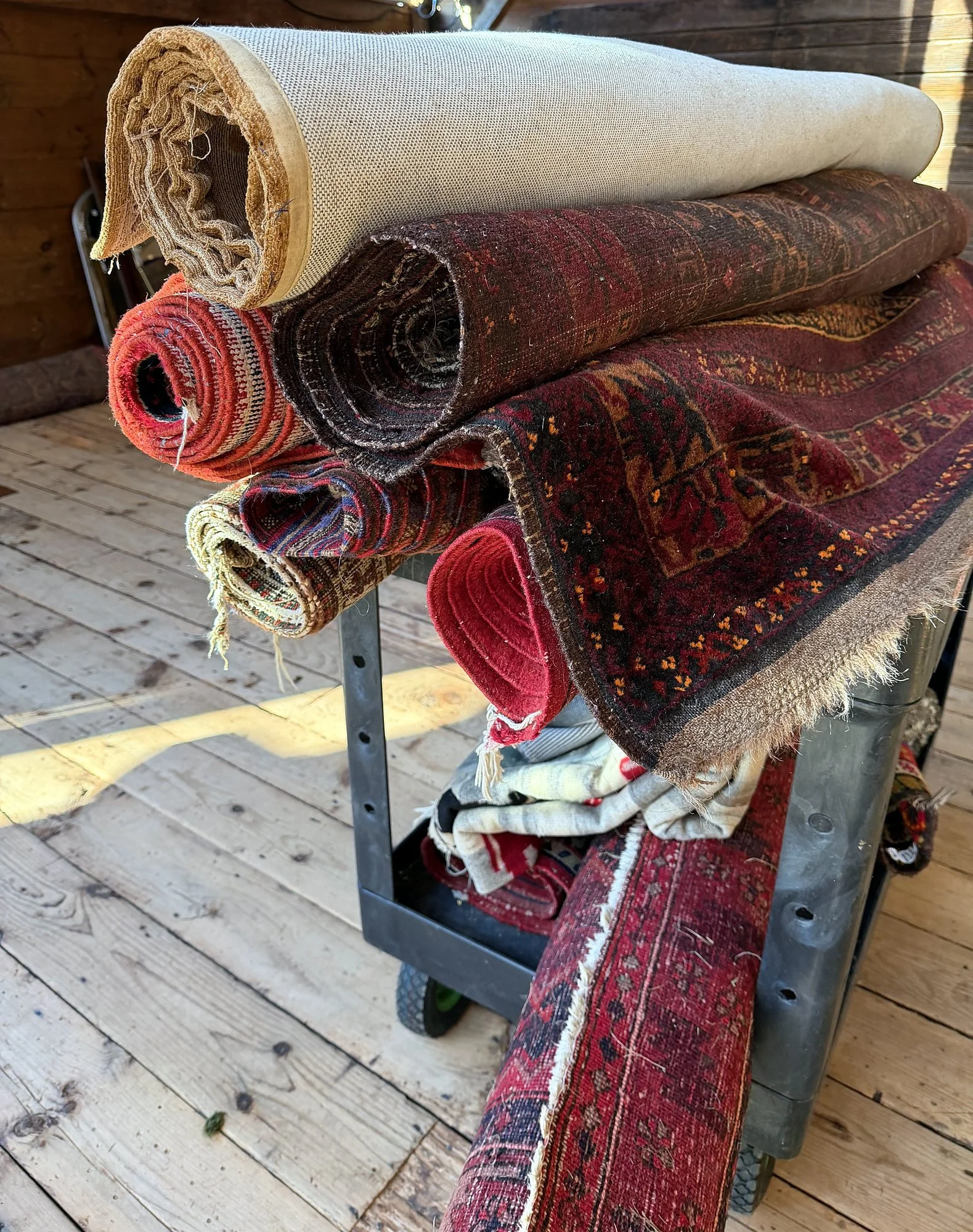 Rolled rugs, assorted.jpg