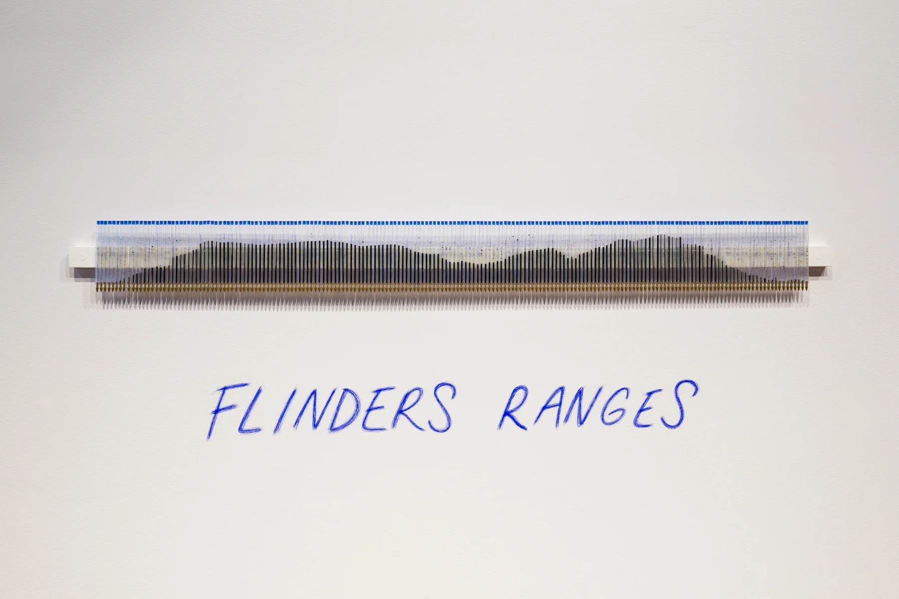 Image: Kylie Stillman, Flinders Ranges, 2016, wall mounted installation, blue ballpoint pens, 40 x 150 cm. Represented by Utopia Art Sydney. Courtesy Anne & Gordon Samstag Museum of Art, University of South Australia. Photograph by Sam Noonan.