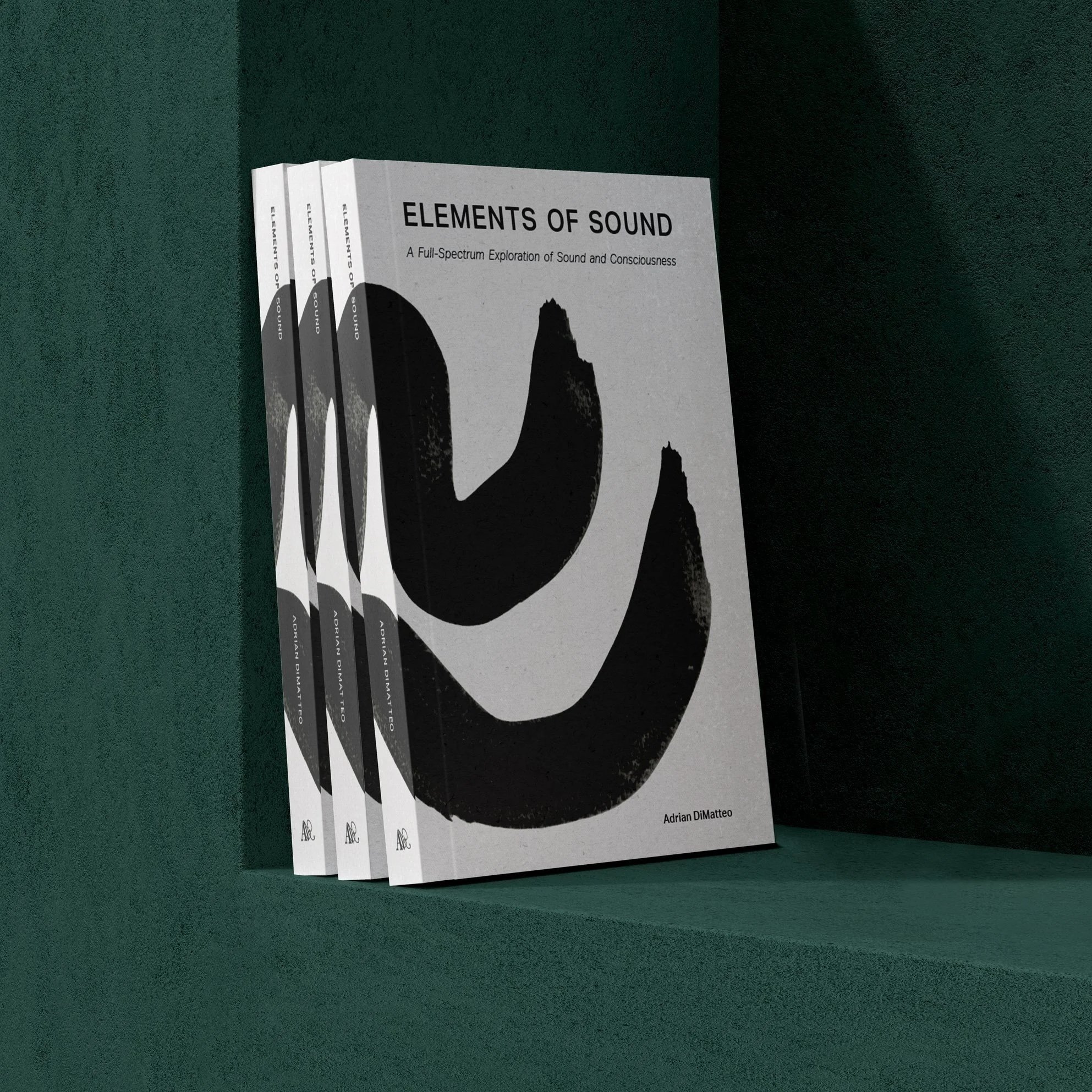Four white books titled 'ELEMENTS OF SOUND' by Adrian DiMatteo are standing upright on a dark green surface, leaning against a matching dark green wall.