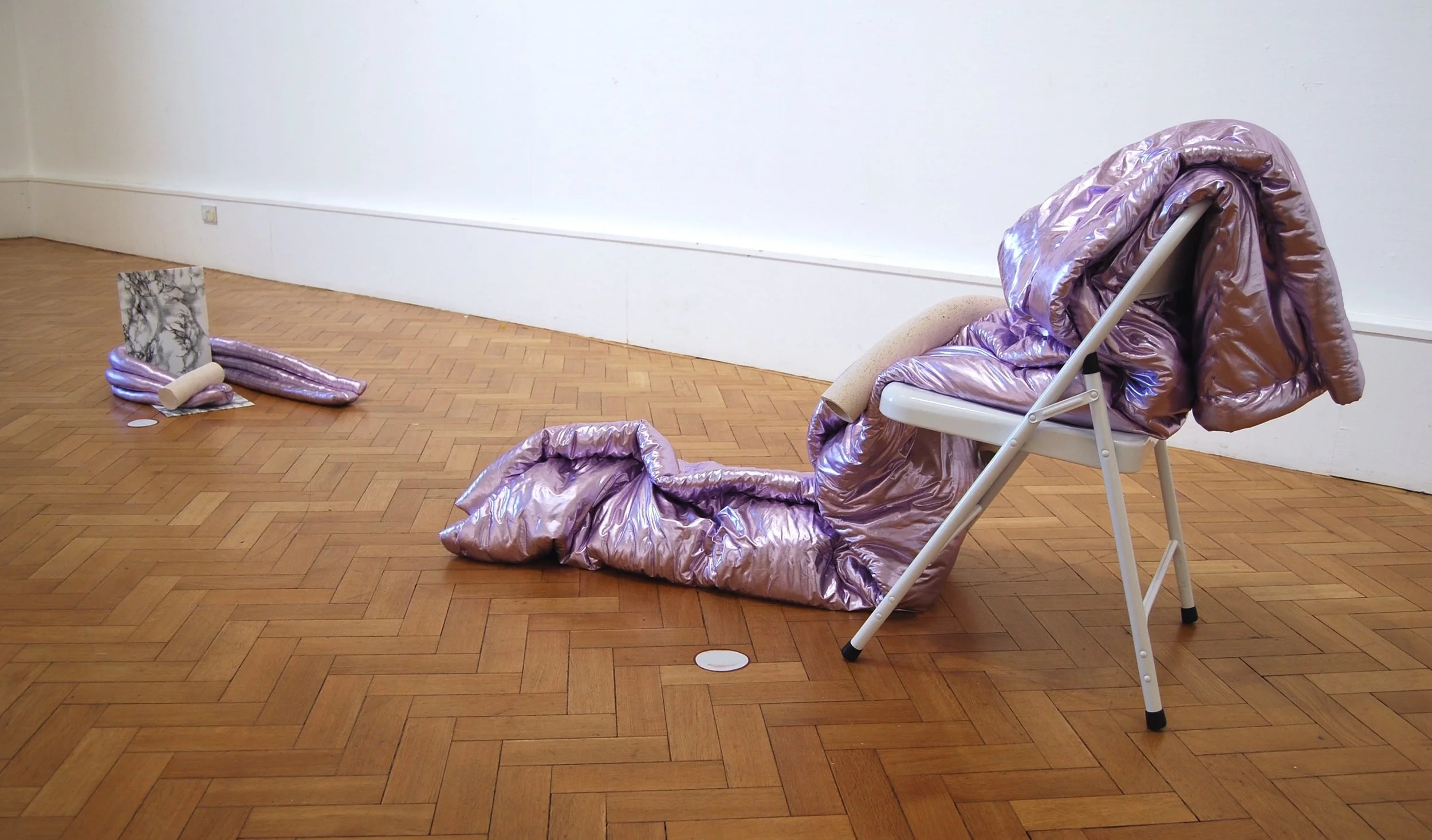 Same, same but different, different, so let’s move in together – Brugge / London – metallic lavender PVC, wadding and extruded clay on white Habitat chair with vinyl cut-out / metallic lavender PVC, stuffing and extruded clay on ‘marmi’ self-adhesive film, packing tape and card with vinyl cut-out, 2017 Shown at ‘ Graffiti Check’, group show at Sassoon Gallery, Folkestone in January 2017 and at ‘Queer Art(ists) Now’ group show at Archive Gallery, Haggerston, London, 12th -15th October, 2017, part of ‘And What? Queer. Arts. Festival.’ 2017 “Arranged in conversation with itself, the work is about queer cohabitation; the discussion, decision and continual renegotiation of the desire to live together. The materials used in the work combine objects and motifs that reference both the memories of time spent away together, along with hopeful future furnishing decisions.”