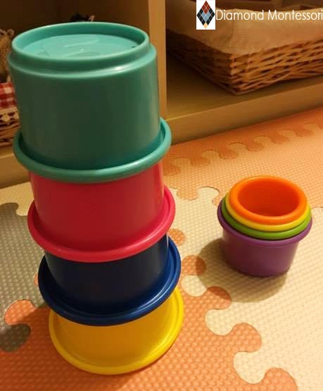 All the expensive, organic, natural wooden toys and her favourite are $6 plastic cups. Obviously. 