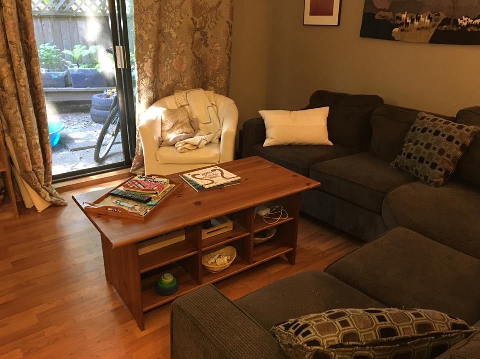 One side of the living room. The table is an old IKEA one that worked out perfectly as I can contain a few toys, and my laptop.