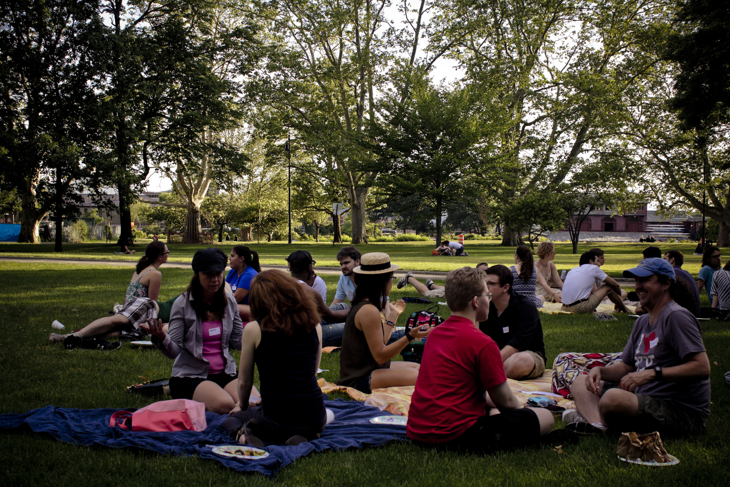  People talking on picnic blankets 