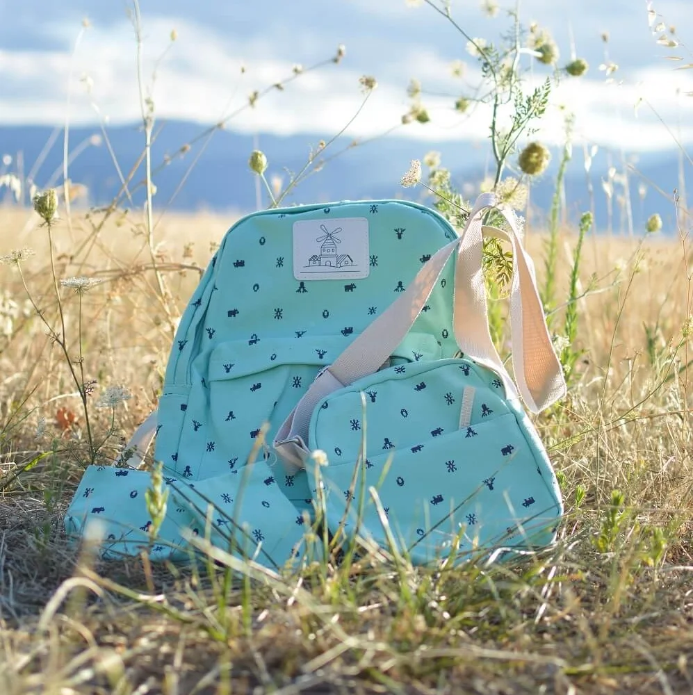 backpack-baby-blue-woman-of-wonder-pete-bellis.jpg