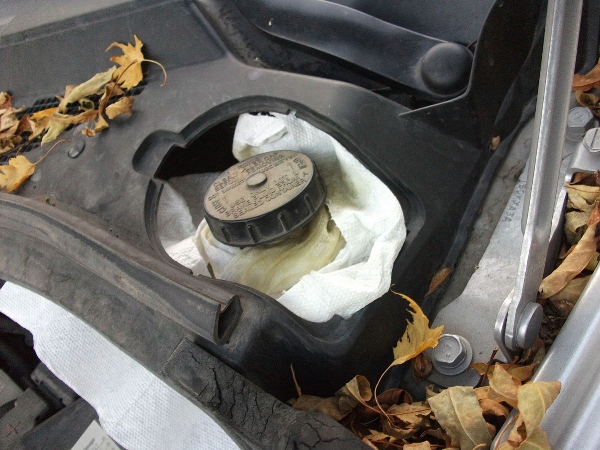 This is brake fluid. It looks a lot like clean oil, doesn't it? But it's slick, even slicker than oil.