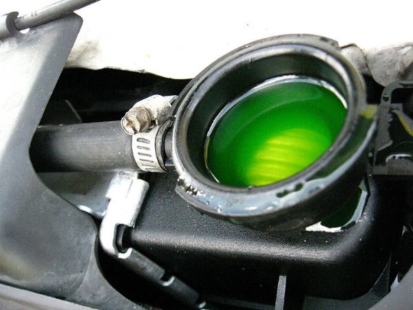 Want to know what color your radiator fluid is? Open the radiator cap. But never when the car is hot!