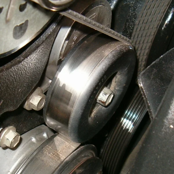 The tensioner keepr the serpentine belt (pictured here) at just the right tension to make the car run perfectly.