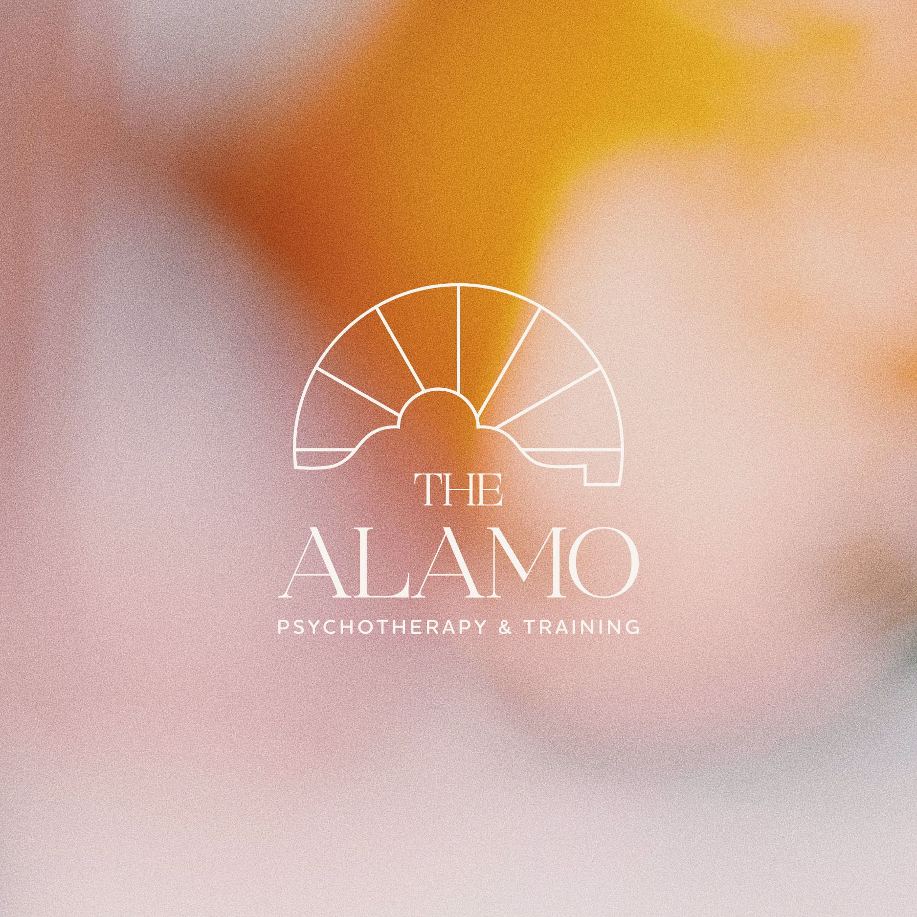 Logo for The Alamo Psychotherapy & Training with a semi-circle graphic, and the text 'THE ALAMO PSYCHOTHERAPY & TRAINING' beneath it.