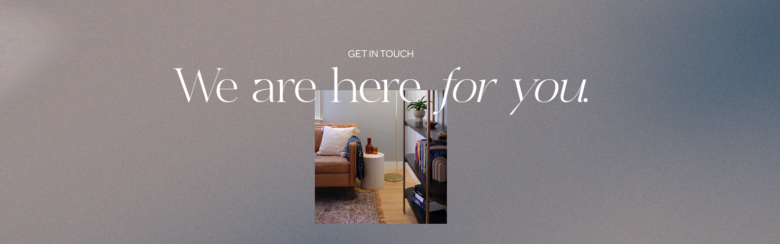 A website home page with the message "We are here for you" and a small photo of a cozy living room with a brown couch, bookshelf, and decor.