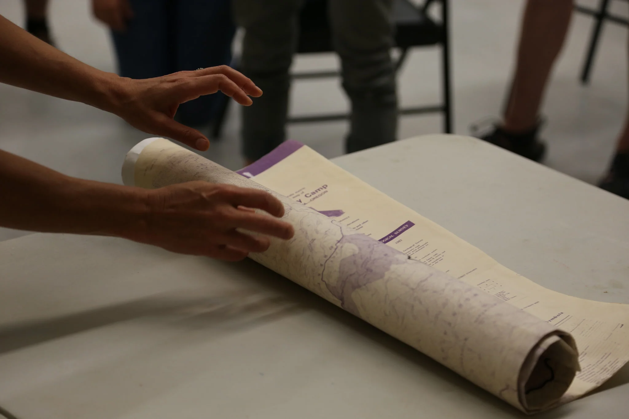 Lisa Hillman sharing maps and other objects at our first digitization workshop in 2014