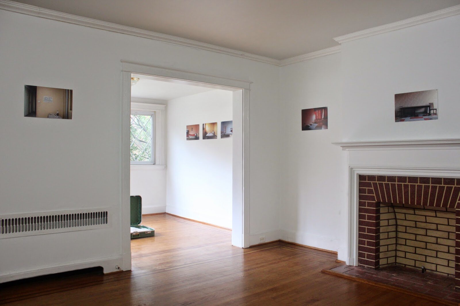  installation view with photographs from&nbsp;  Chambres   &nbsp; (2005) 
