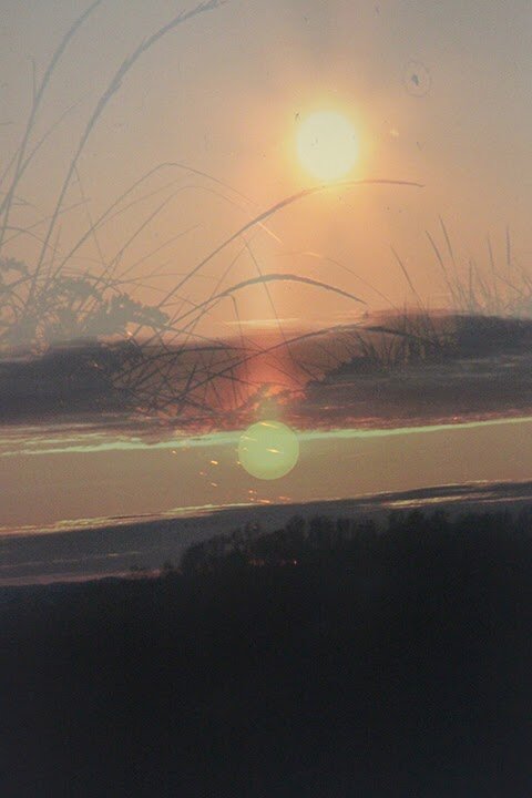  Lauren Edwards -&nbsp; Three Suns &nbsp;(details)&nbsp;(projector, found slide, archival pigment print) 2011 