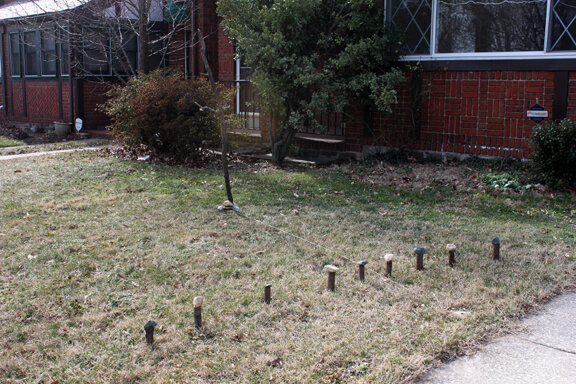   Diptych &nbsp;(outside sun compass: branch, string, cut branches&nbsp;as markers, stones from Chicago as markers, stones from Baltimore as markers) 2013&nbsp;[in two parts] 