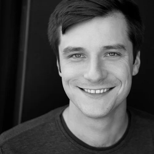 Christopher Woolsey (Mark Pruitt) Chris was born and raised in Portland, which might account for his obsession with bike riding all winter long. When he's not floating on a Second City cruise ship, he performs sketch comedy around Chicago and has had his work premiered at the New York International Fringe Festival.