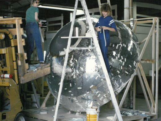  Undated image of Yolanda and her team working on a 10-foot disco ball. Image courtesy  Omega National Products . 