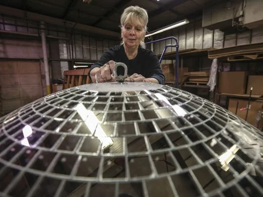 Yolanda in 2016, putting the finishing touches on a disco ball. Image courtesy Louisville’s Courier-Journal.