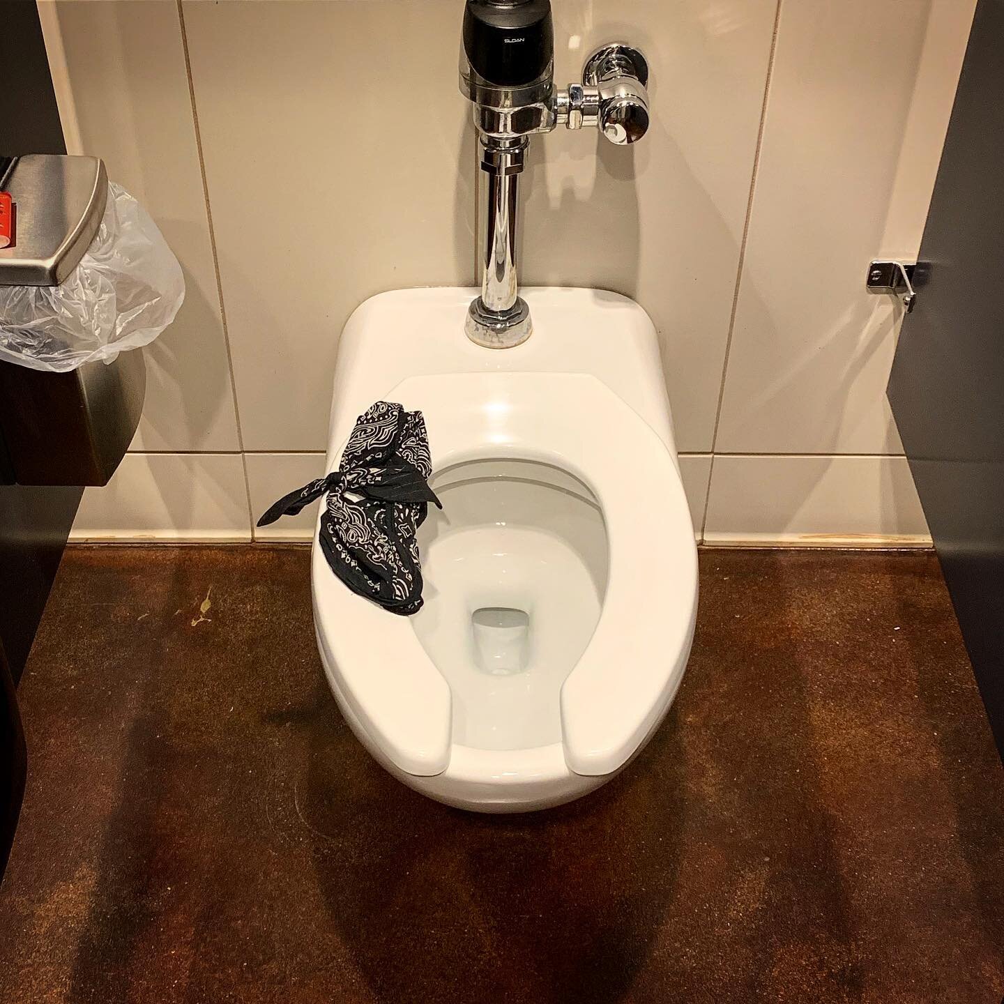 Black handkerchief on toilet means...