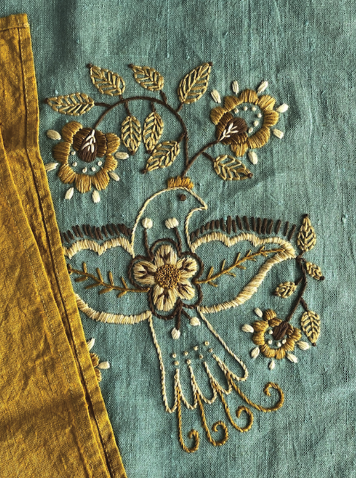 ZIGI - Joyful bird with open wings.