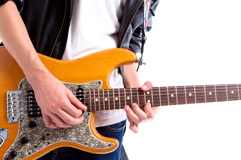 Hands on a guitar
