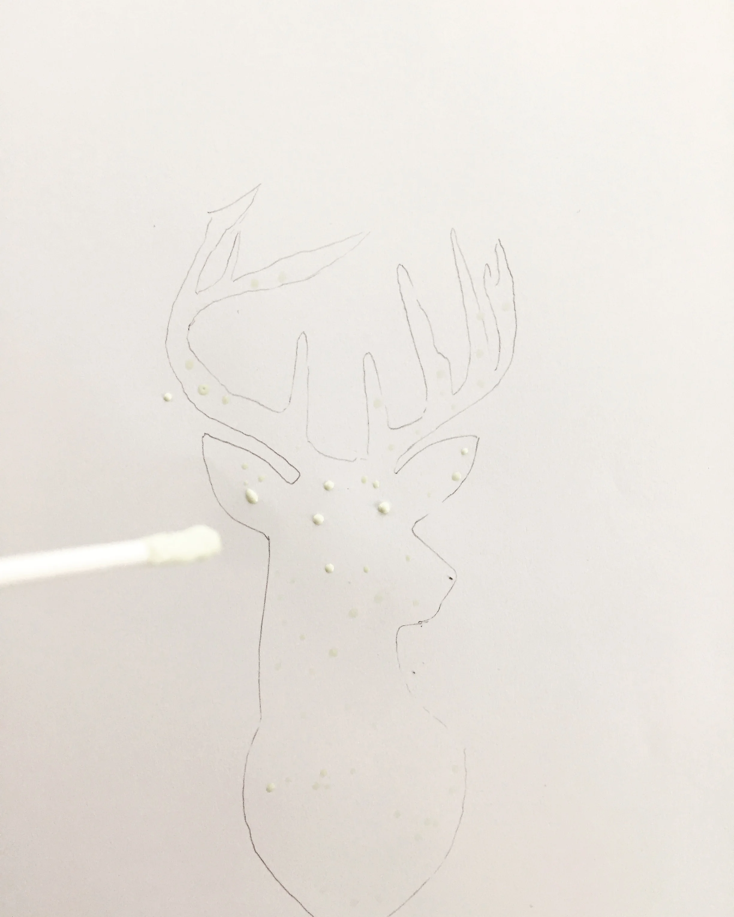 Reindeer traced in pencil with drips of art masking fluid