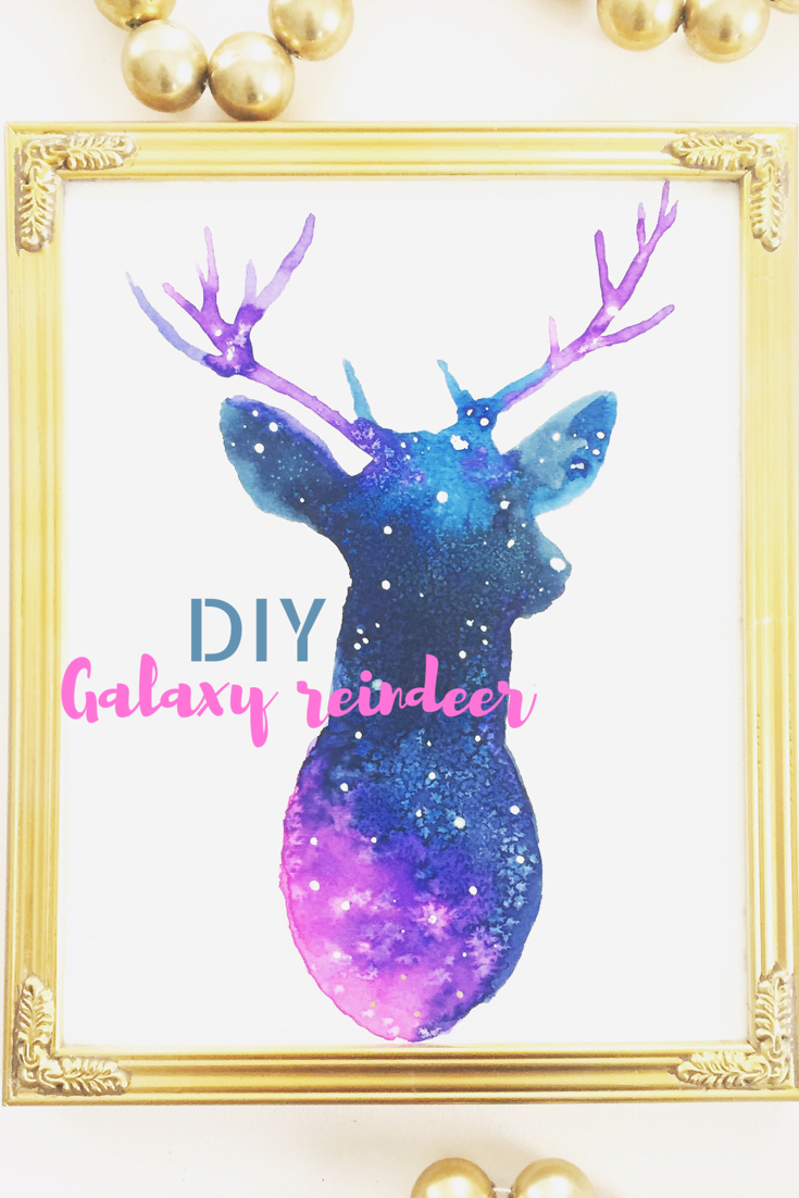 Galaxy Reindeer in gold picture frame with gold decorative beads. Caption reads "DIY Galaxy Reindeer"