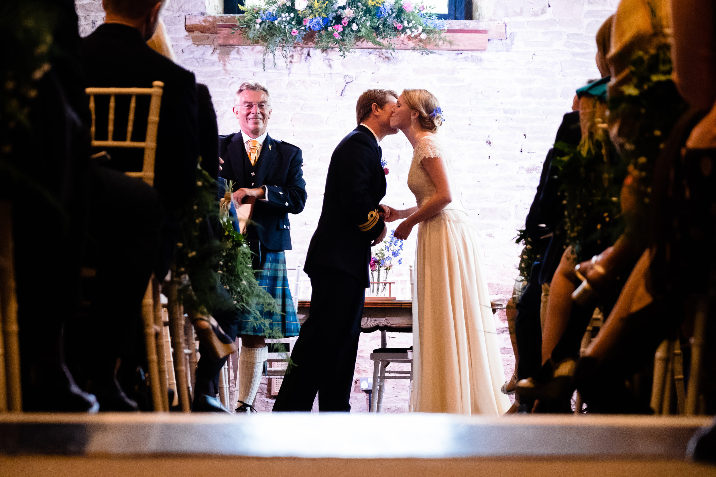 A bride and groom kissing at Merriscourt Wedding Venue, Oxfordshire