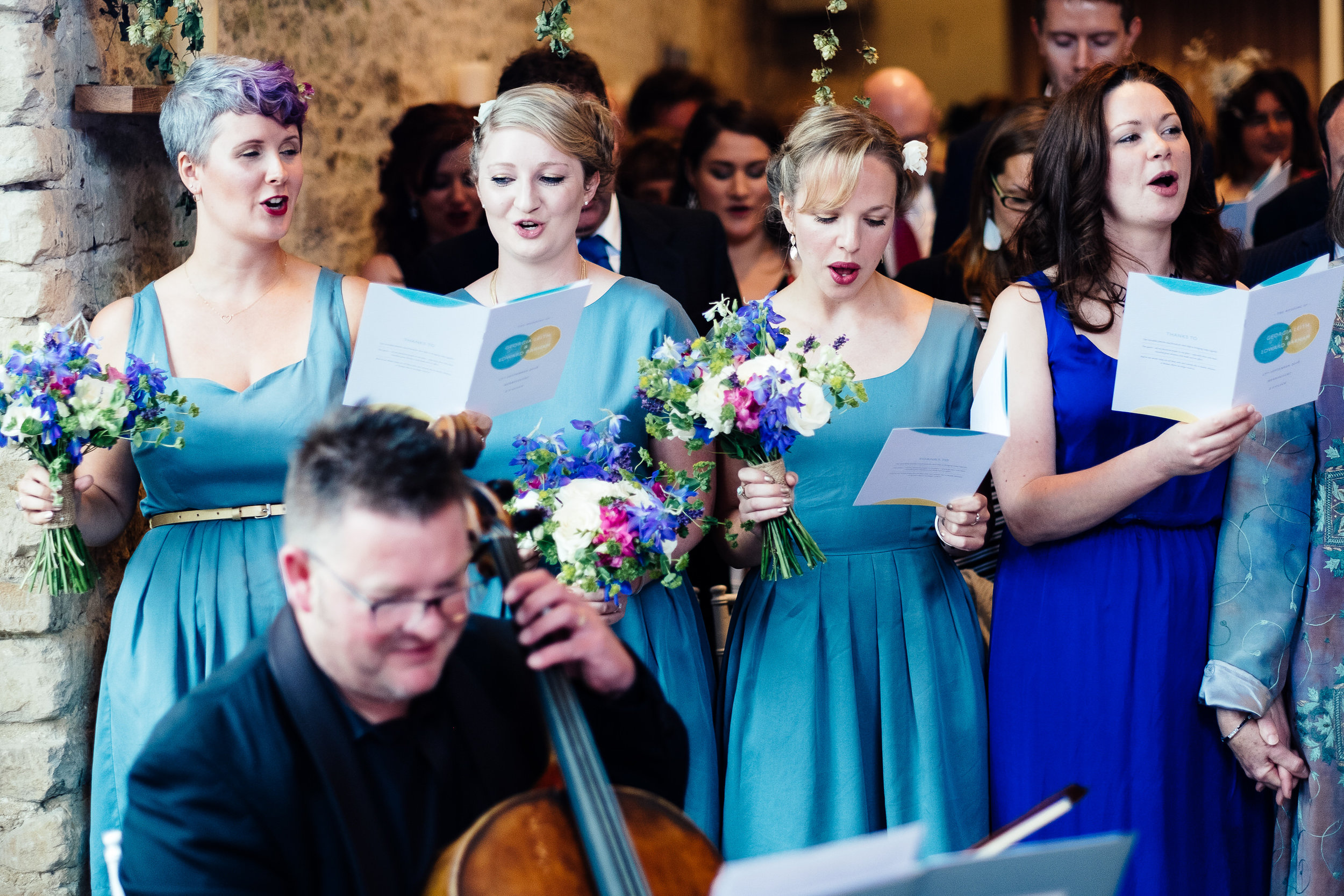 Guests singing at a wedding at Merriscourt Wedding Venue, Oxfordshire