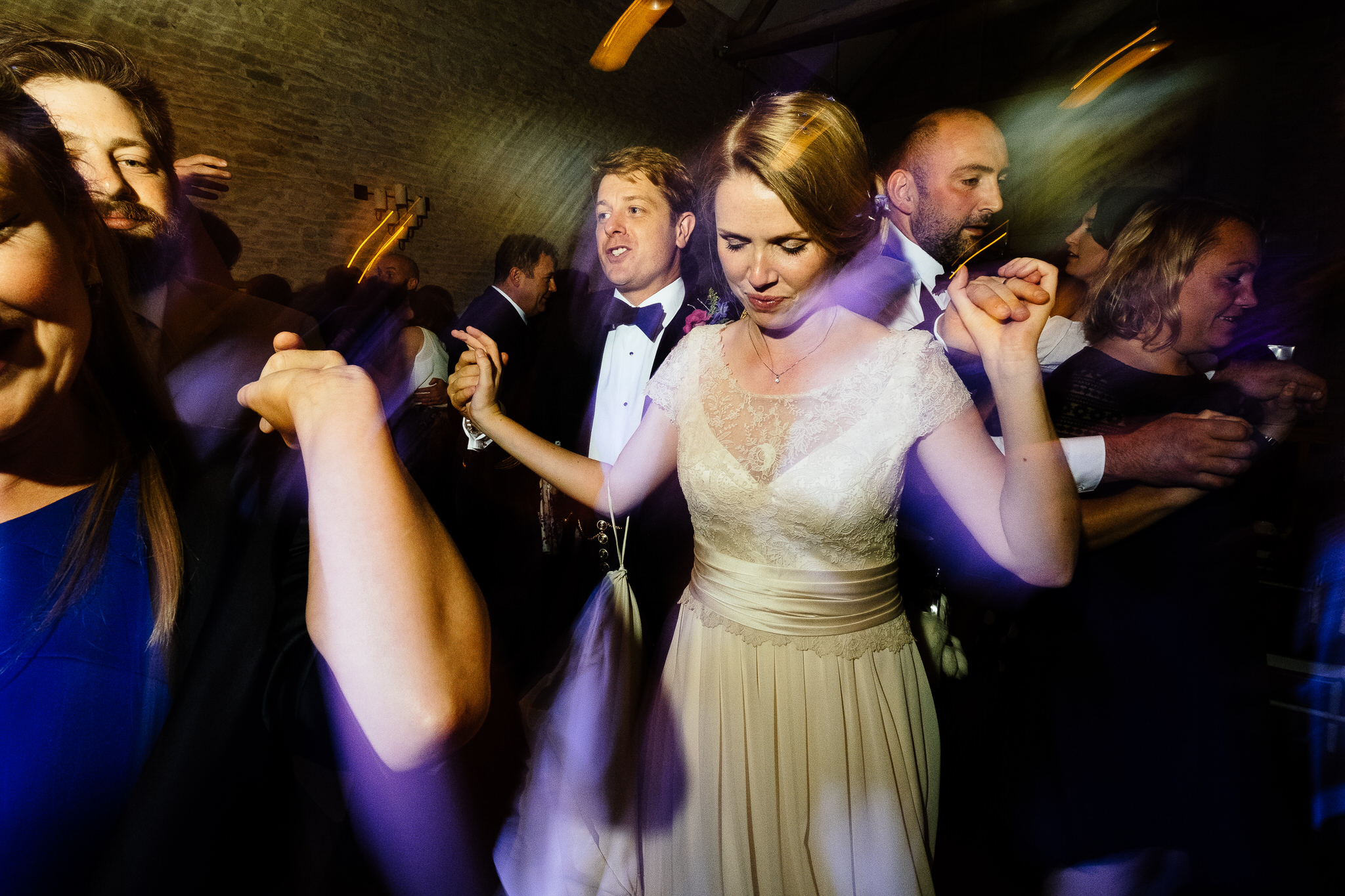A bride and groom partying at a wedding at Merriscourt Wedding Venue, Oxfordshire
