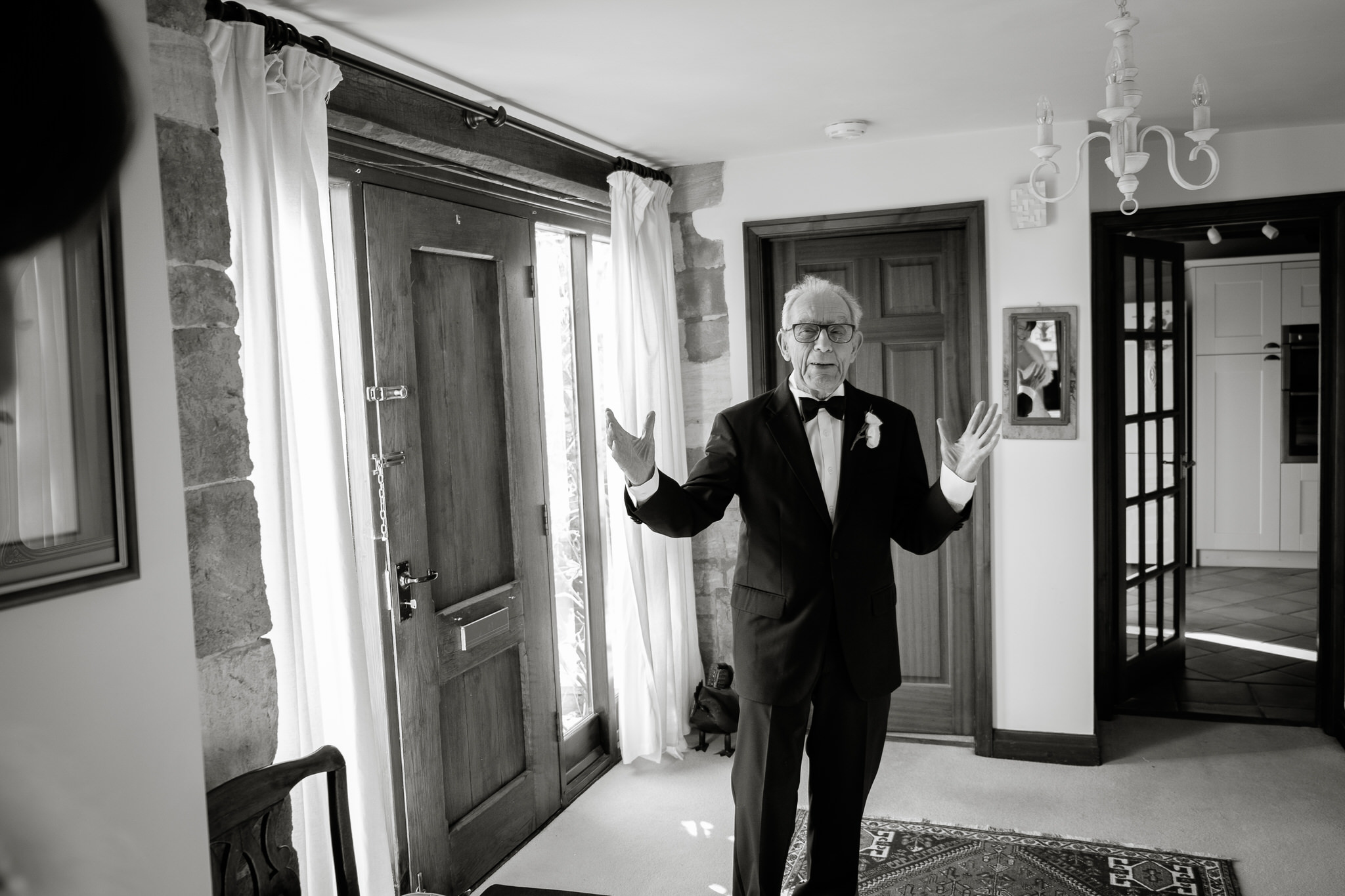 Father of the Bride seeing his daughter in her dress. Photography by Sam and Steve Photography