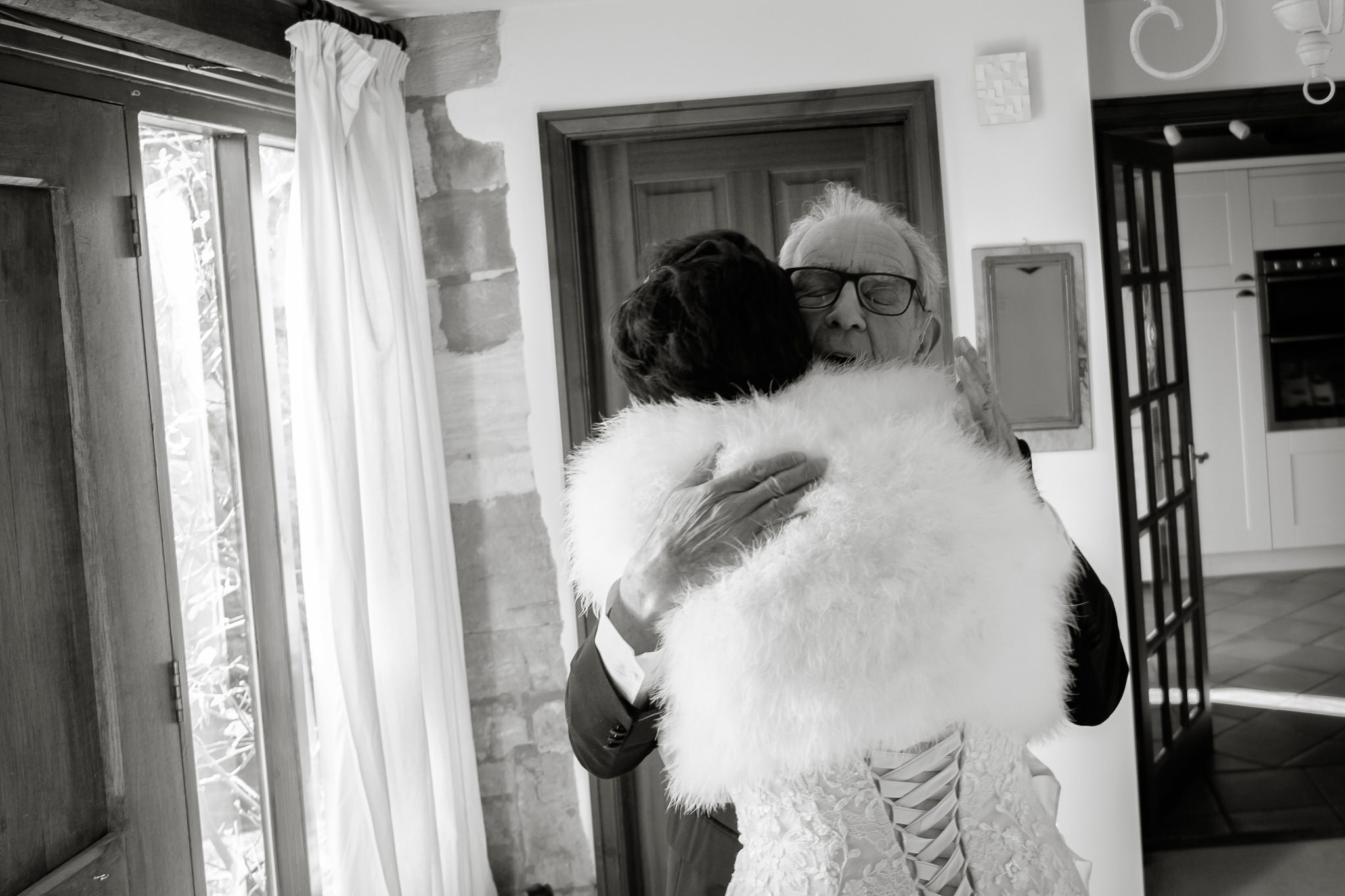 Father of the bride hugging his daughter, bride to be. By Sam and Steve Photography.