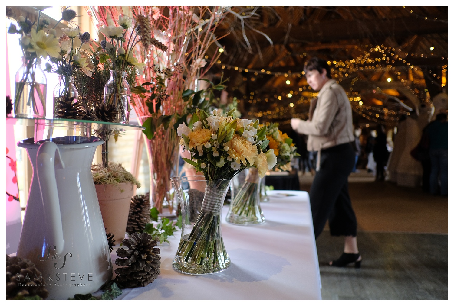 A lovely floral arrangement by Penny Blossoms at the Tythe Barn wedding fair.