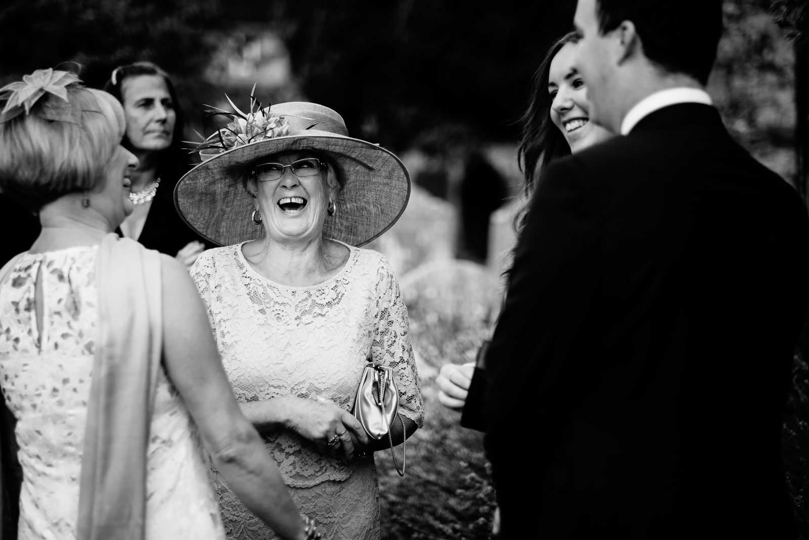 Guests at a wedding at Chinnor Church. By Sam and Steve Photography