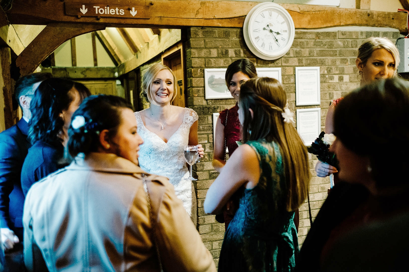 A bride with her guests at Lains Barn Wedding Venue Oxfordshire