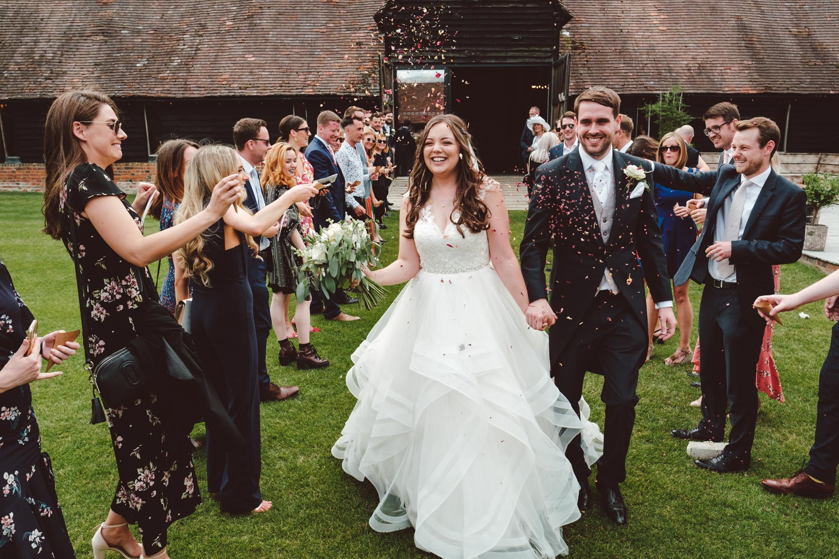 Lains Barn Wedding Photography of the wedding of Jade and Joshua. Documentary style wedding photography by Sam and Steve Photography