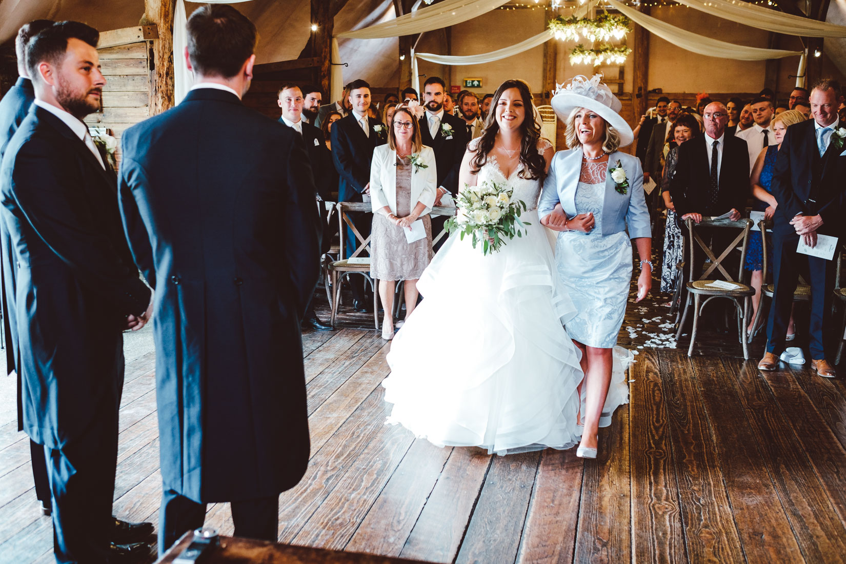 Lains Barn Wedding Photography of the wedding of Jade and Joshua. Documentary style wedding photography by Sam and Steve Photography