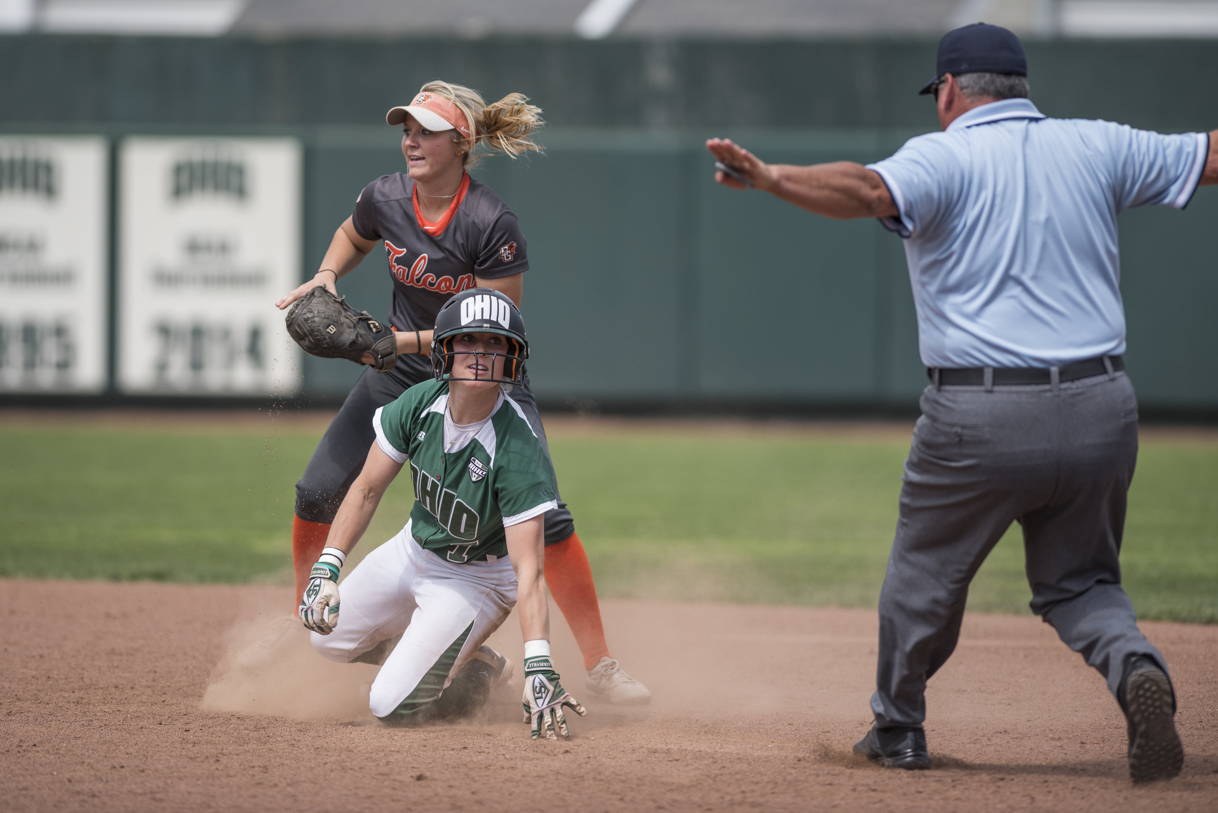 Ohio University’s Taylor Saxton safely slides into second base during the Bobcats game against Bowling Green on April 21, 2017. The Bobcats won 7-1.