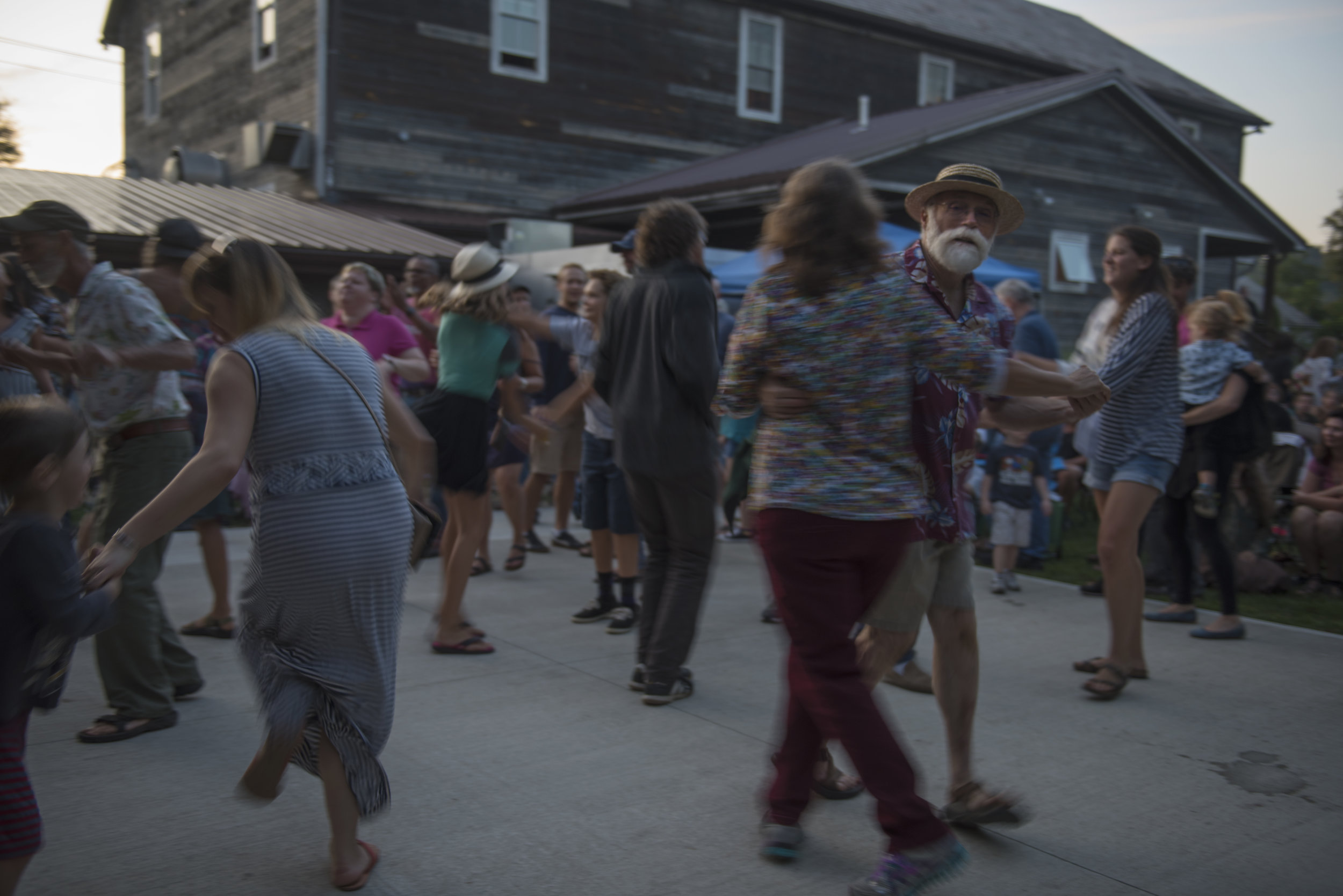 McGee and his wife Robin dance together to the music of The Wild Honeybees at Eclipse Country Store in The Plains, Ohio on Sept. 3, 2017. McGee loves to dance and occasionally attends contra dance classes at Arts West with other city councilmembers. 