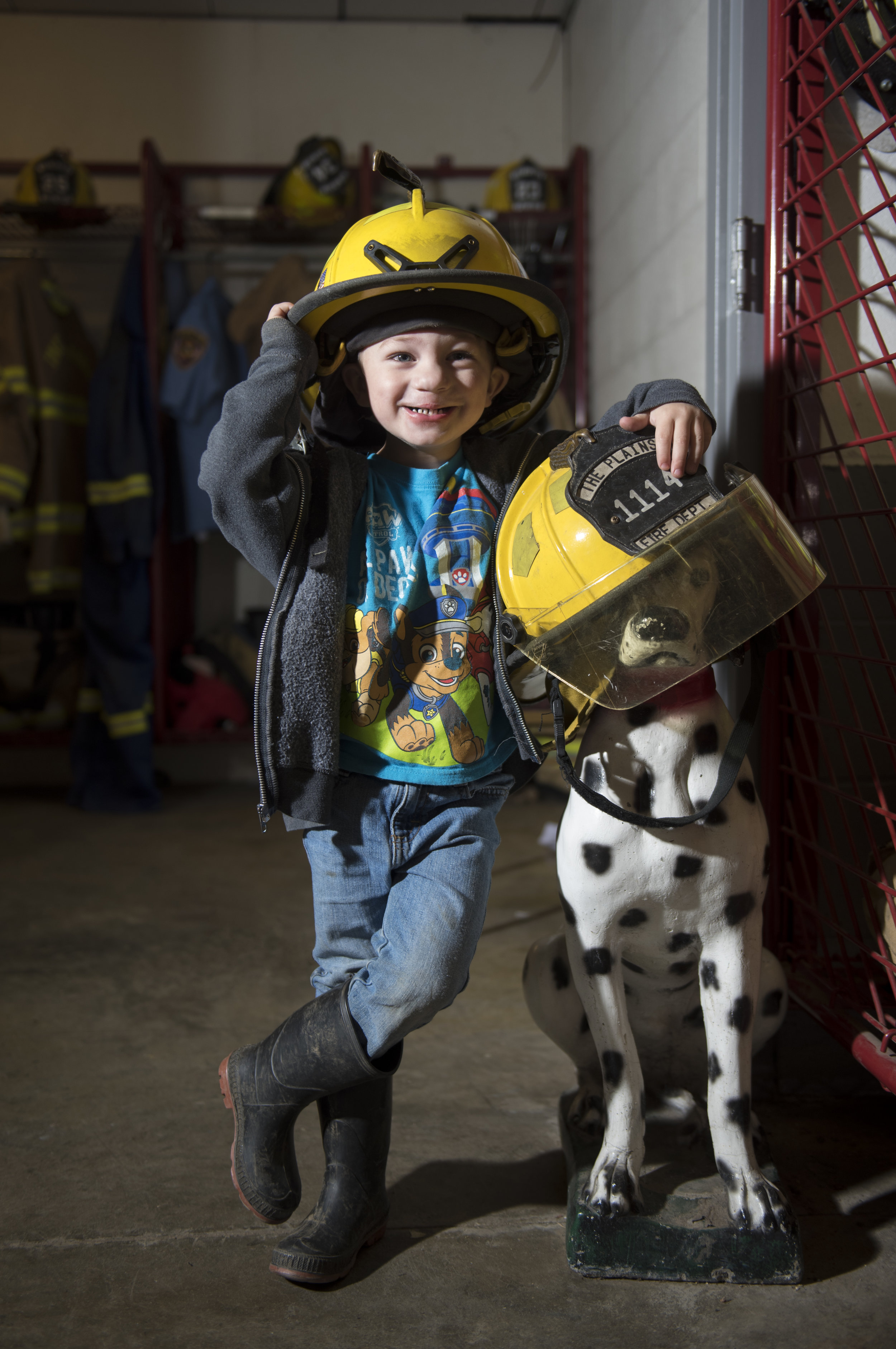 Mason Cottrill poses for his portrait inside The Plains Volunteer Fire Department on Nov. 13, 2018 in The Plains, Ohio. Cottrill’s father is one of the firefighters.