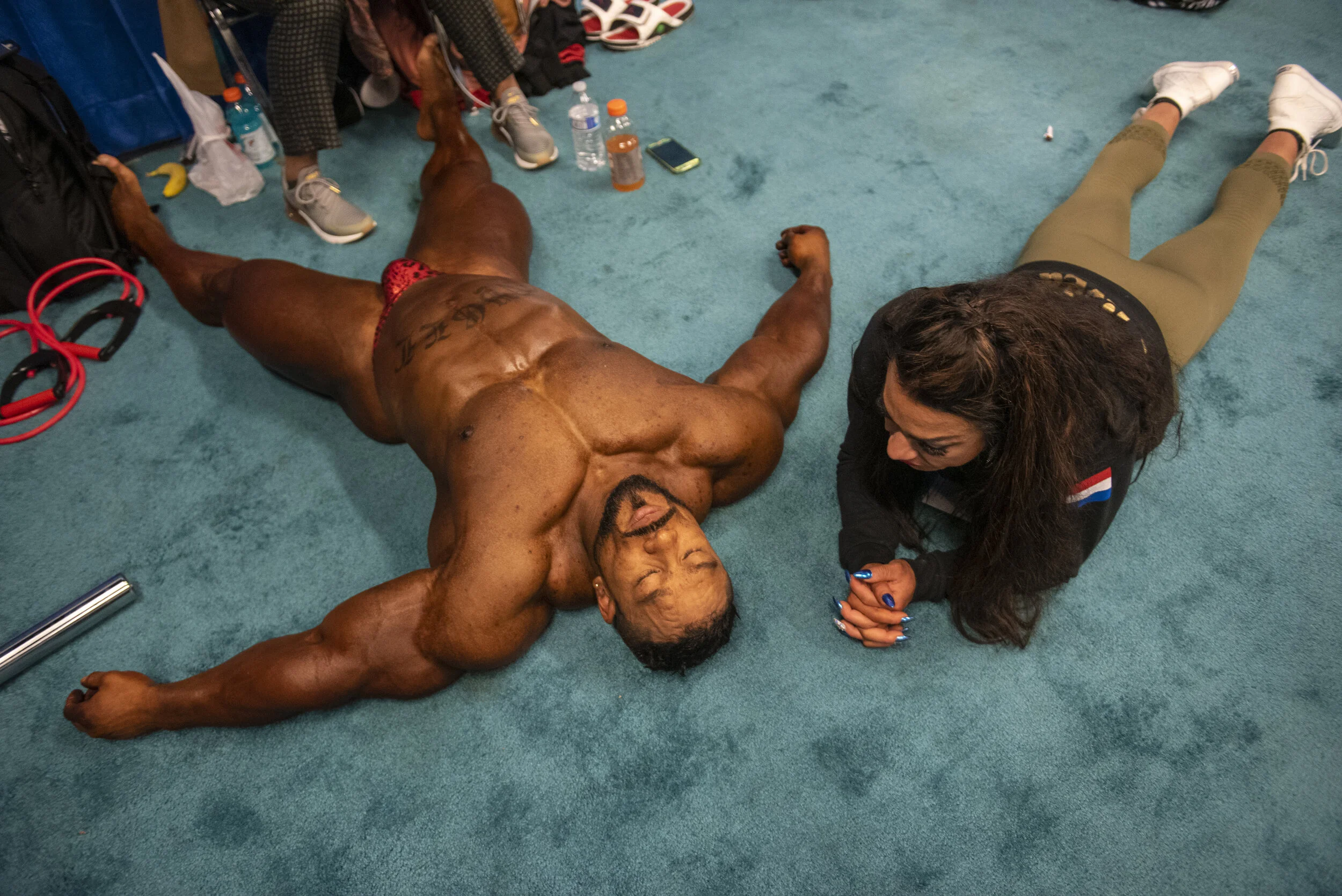  A competitor rests in the pump up room backstage at The Arnold Classic in Columbus, Ohio on March 3, 2019. 