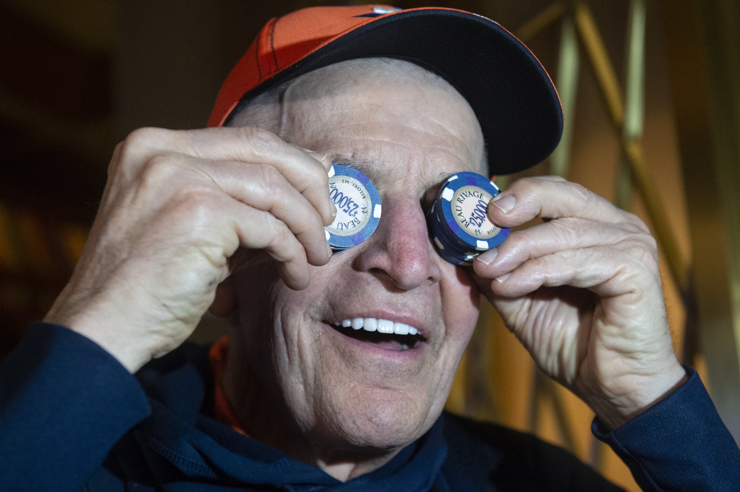  Jim McIngvale, better known as ‘Mattress Mack’, holds up $25,000 chips over his eyes before placing a bet $500,000 on the Houston Cougars Men’s Basketball team to win the NCAA Tournament at the Beau Rivage in Biloxi on Tuesday, Nov. 15, 2022.  