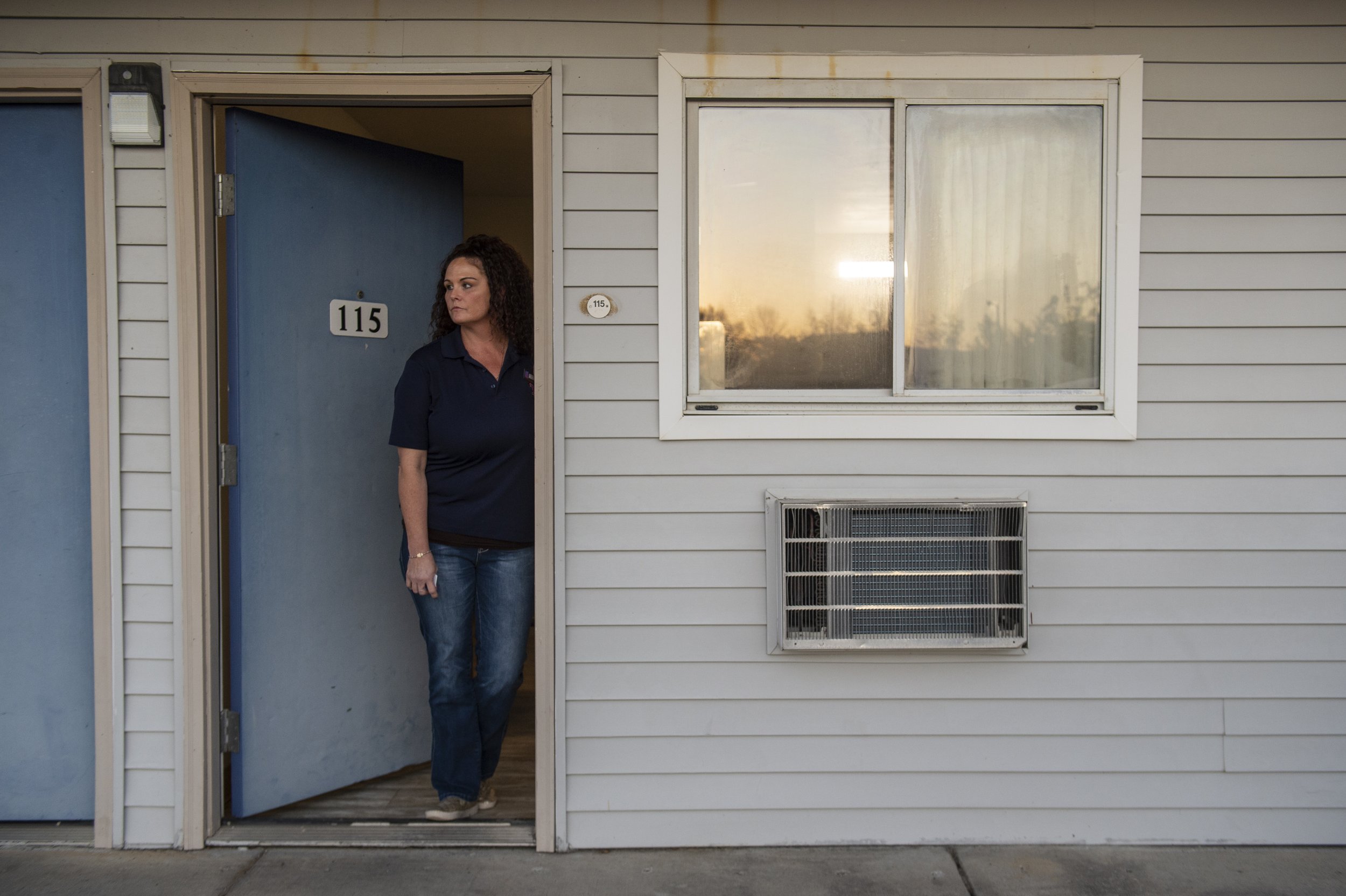  Tiffany Scheid, who was the manager at Motel 6 in Bay St. Louis on Dec. 13 when two police officers were shot and killed in the parking lot, stands in the doorway of the room the perpetrator — veterinarian named Amy Brogdon Anderson — had rented the