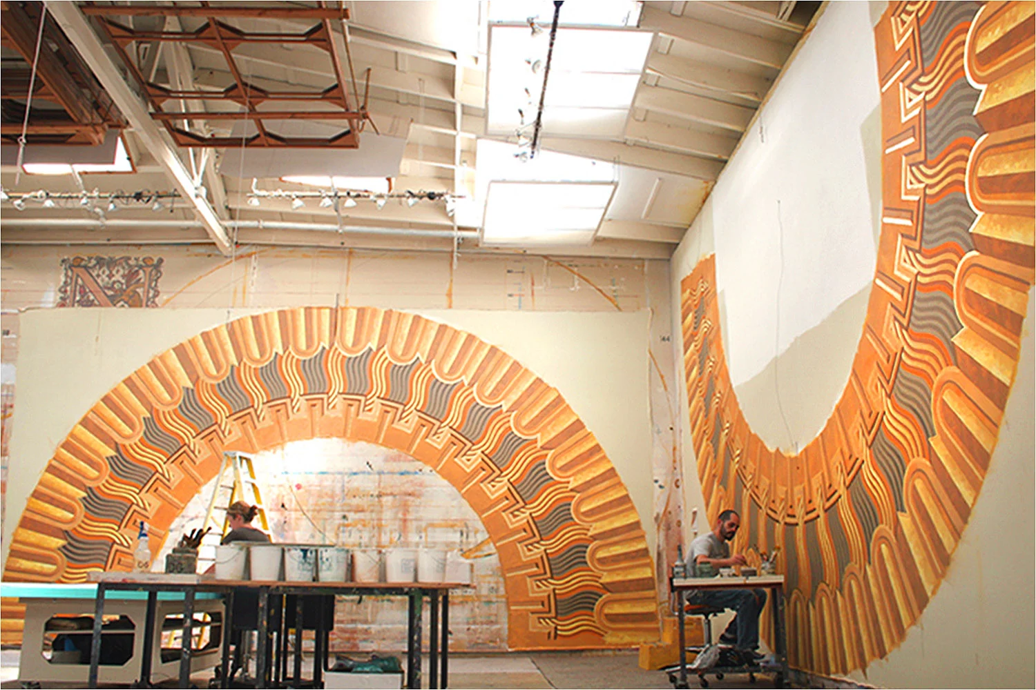 Components for a dome mural being painted at Mural Arts studio. This mural is a modern interpretation of traditional ornament with 23k gold leaf accents.