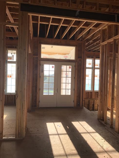 In the living room looking towards the foyer/front door