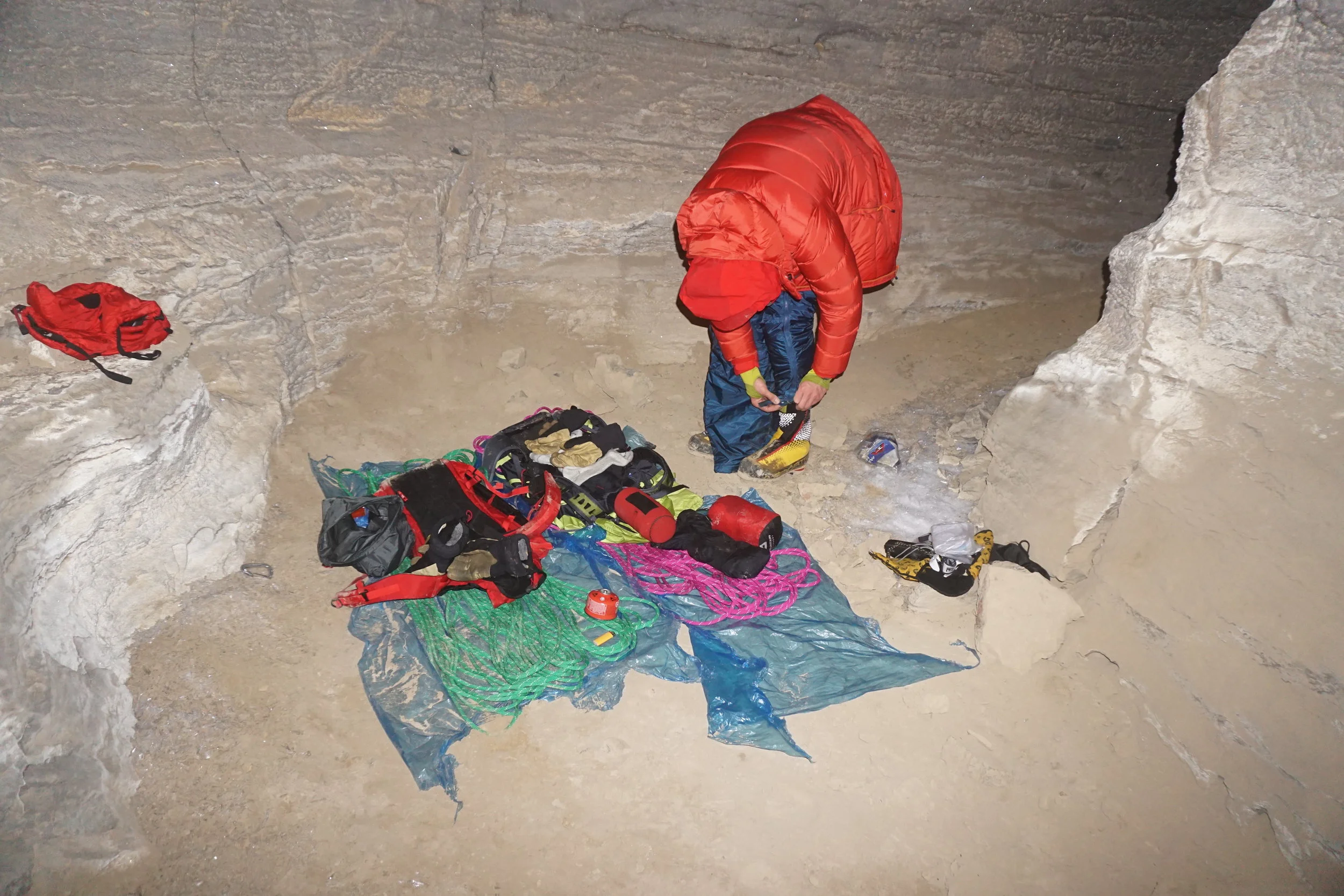 with all our worldy possessions, we get ready for a shiver bivi in the cave. north face of mt. alberta. Photo: uisdean hawthorn