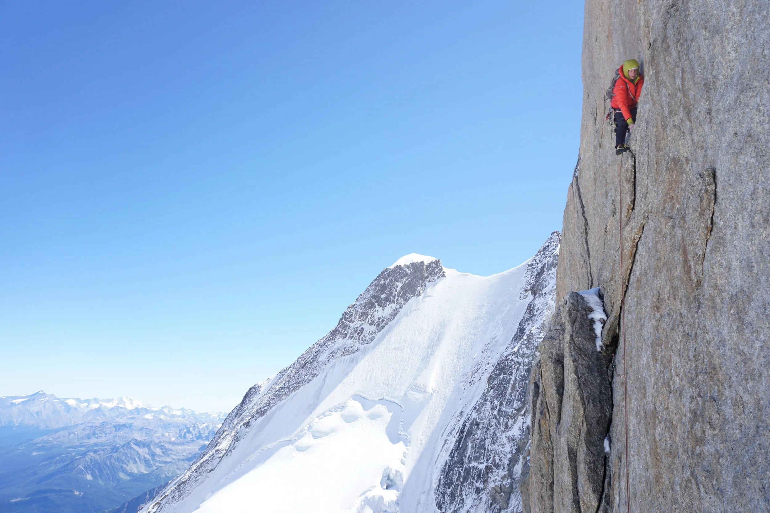 High on DP, and climbing in the shade. Photo: Uisdean Hawthorn