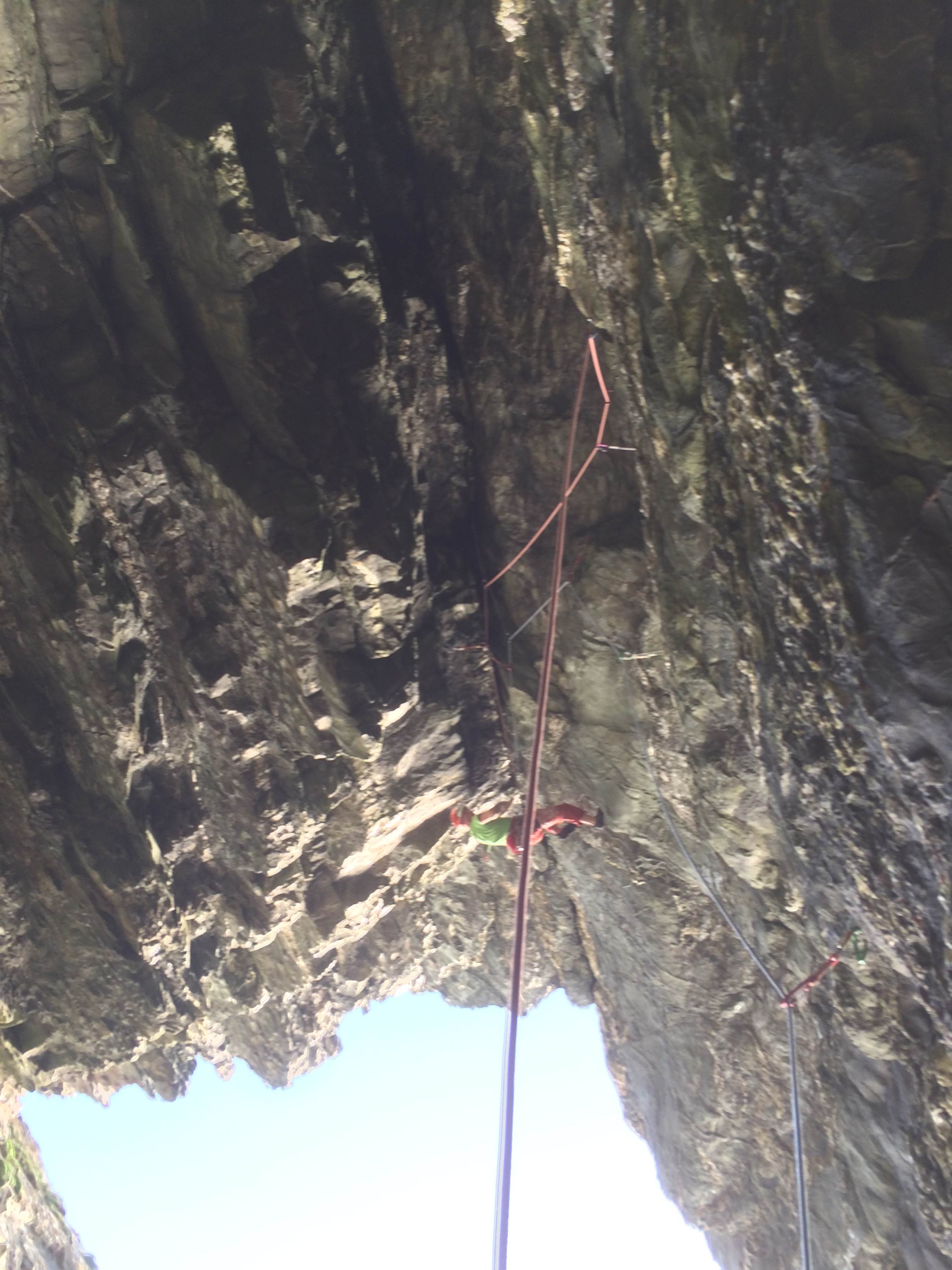 Initiating 'upside down sideways' action on Rock of Ages. Thanks to everyone who went down to this little zawn with me! Photo: James Taylor.